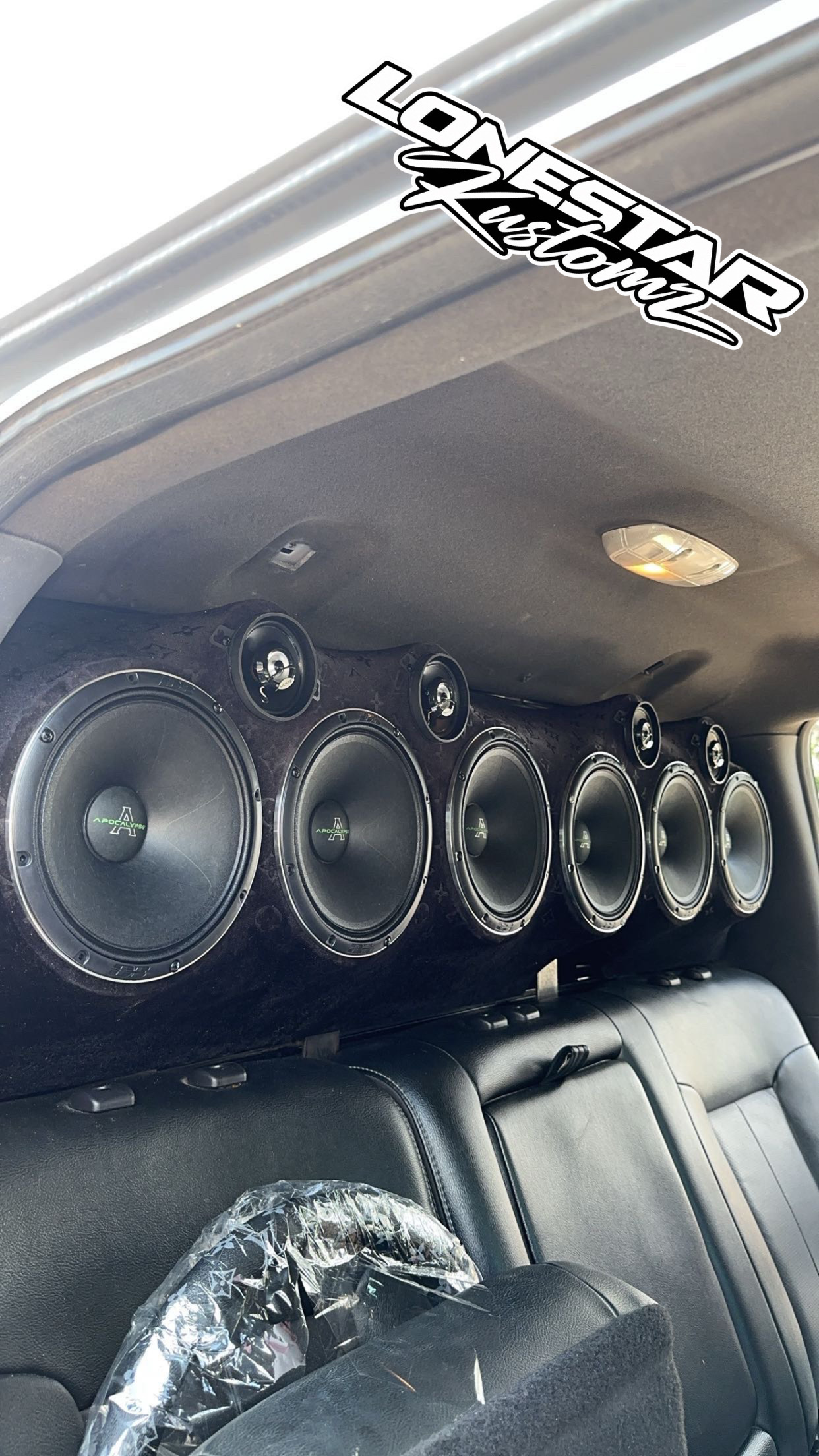 Installed Lonestar Kustomz rack with six large speakers and four smaller speakers
